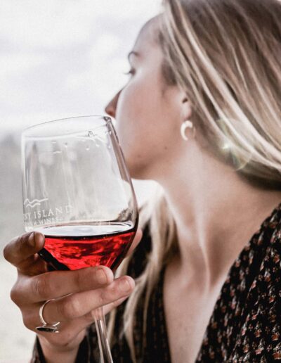 Lady with glass of wine at Bruny Island Premium Wines