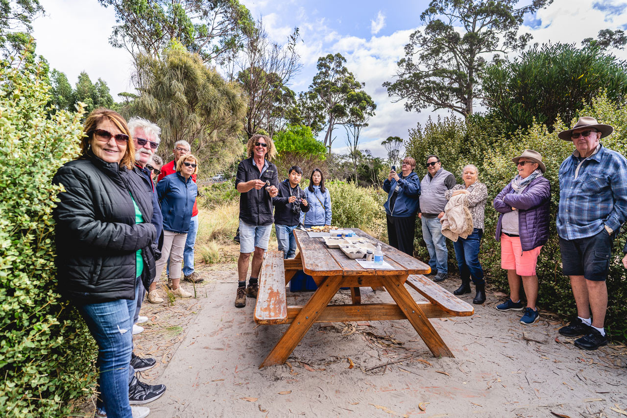 A tour group waiting to eat morning tea on Bruny Island