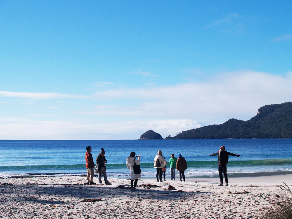 Tour group on the beach at Adventure Bay, Bruny Island, Tasmania
